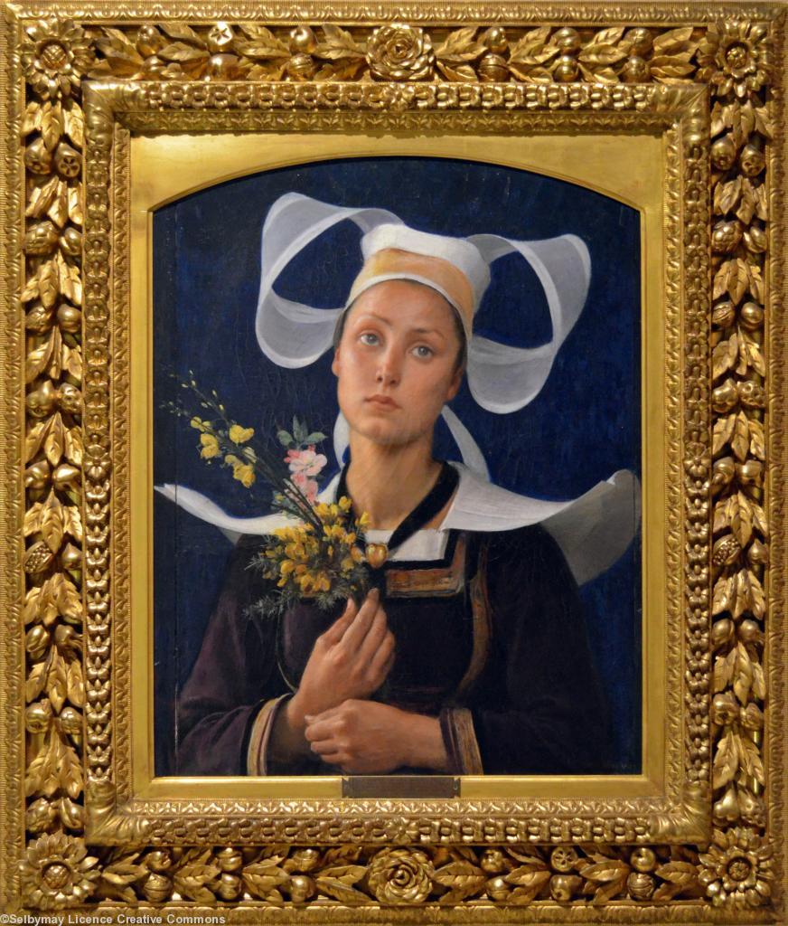 <i>La Bretonne au bouquet</i> icône bretonne peinte en 1899 par Hippolyte Berteaux sur la demande de la biscuiterie Lefèvre-Utile. Musée d\'histoire de Nantes. <b>Cliquer pour voir le tableau en entier</b>. <i>La Bretonne au bouquet</i> icône bretonne peinte en 1899 par Hippolyte Berteaux sur la demande de la biscuiterie Lefèvre-Utile. Musée d\'histoire de Nantes. <b>Cliquer pour voir le tableau en entier</b>.