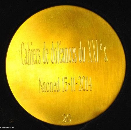 Médaille de l'Institut culturel, revers. Cahiers de Doléances du XXIe siècle. Naoned 15-11-2014 (ph. du site des Bonnets rouges). Médaille de l'Institut culturel, revers. Cahiers de Doléances du XXIe siècle. Naoned 15-11-2014 (ph. du site des Bonnets rouges).