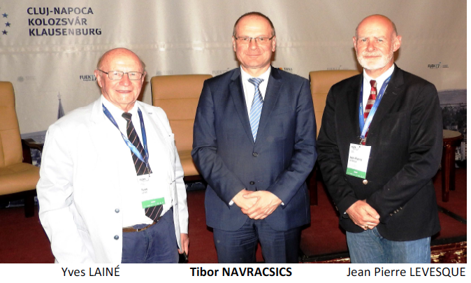 Yves Lainé (à gauche) et Jean-Pierre Levesque (à droite) en Roumanie avec le professeur hongrois Tiber Navracsics, commissaire européen à l'Éducation, la Culture, la Jeunesse et aux Sports. D'après Jean-Pierre Levesque, la nouvelle Commission européenne nommée en 2014, est beaucoup plus conciliante, en particulier à cause du BREXIT.
